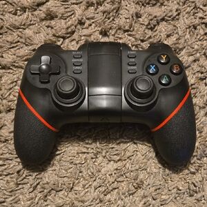 Wireless Black Game Controller with Red Accents